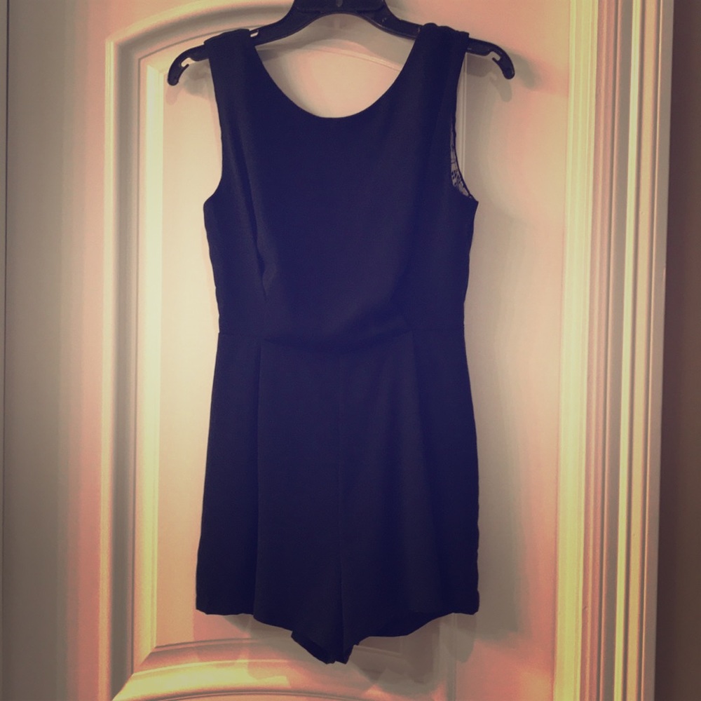 Boutique Quality Black Romper with Lace Detail - S